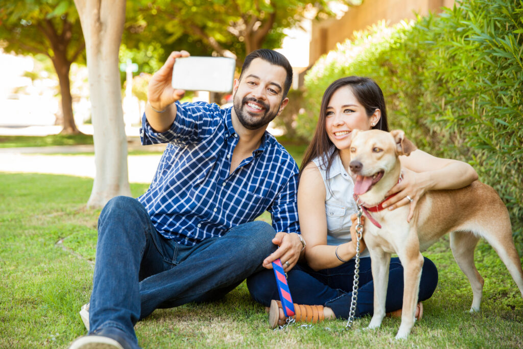 couple with their dog selfie