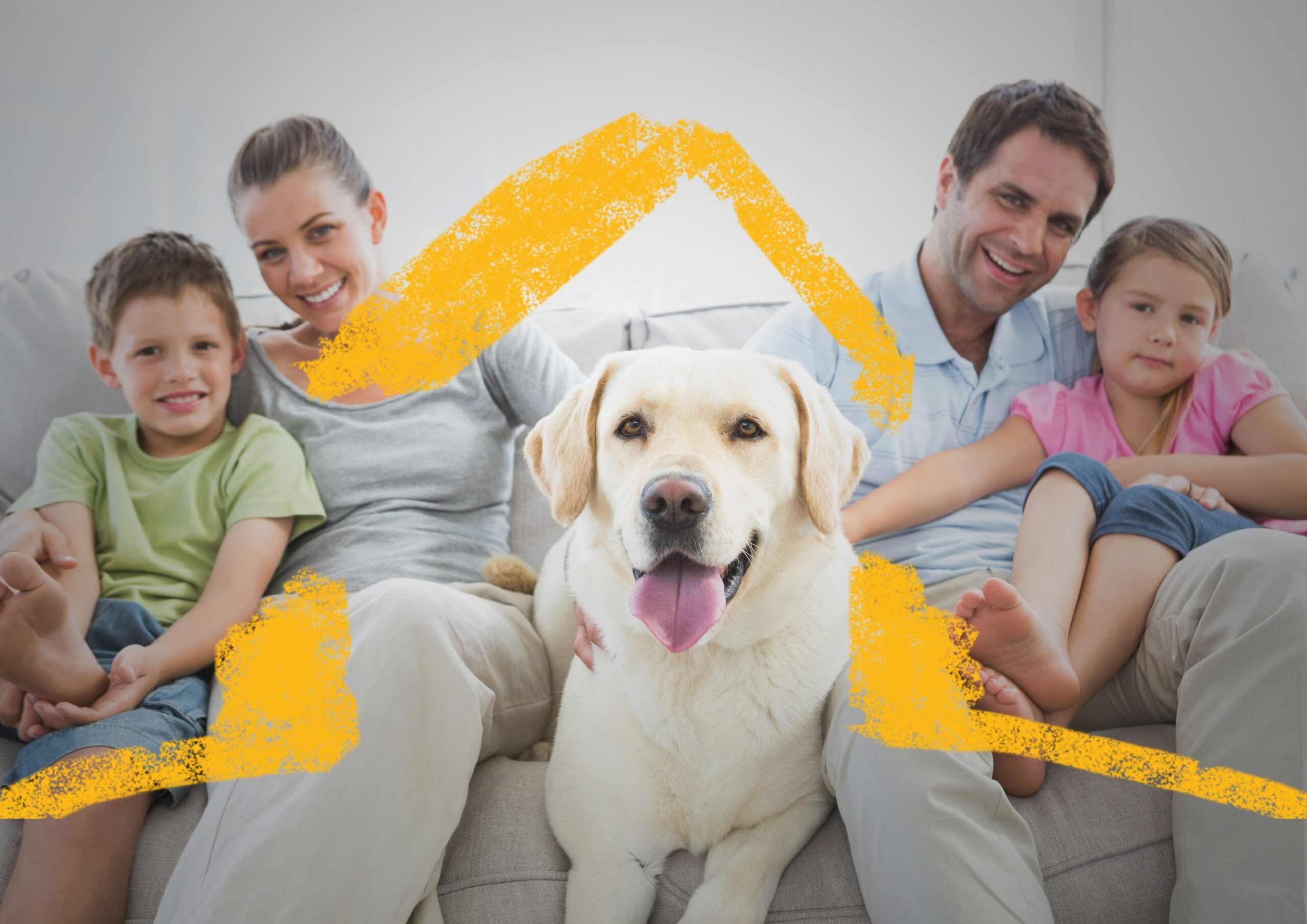 family with dog on sofa